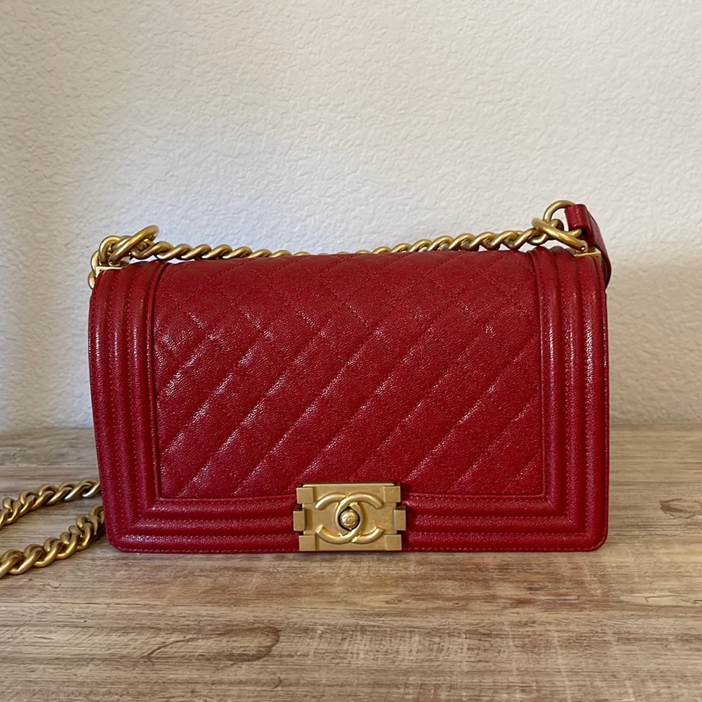 SLIGHTLY USED chanel red boy bag in gold hardware and caviar leather